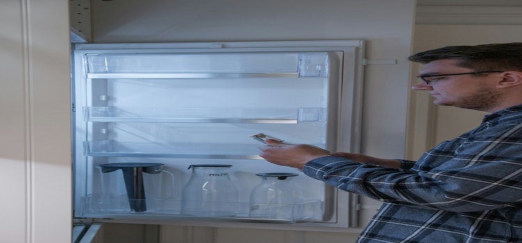 what causes moisture in refrigerator